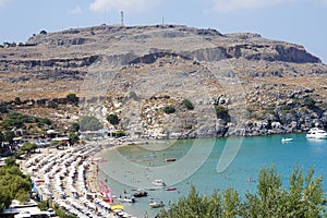 View of Lindos beach in August. Lindos, Rhodes Island, Dodecanese, Greece