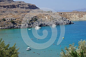 View of Lindos beach in August. Lindos, Rhodes Island, Dodecanese, Greece