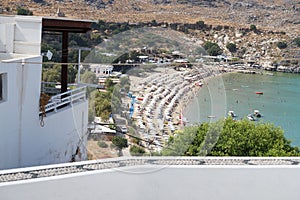 View of Lindos beach in August. Lindos, Rhodes Island, Dodecanese, Greece