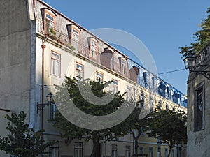 View of Lisbon street at medieval quarter Alfama at Santa Maria Maior district, Portugal.