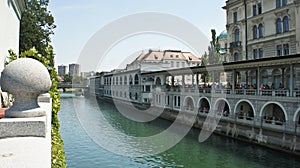 View of the Ljubljanica river in old town, beautiful architecture, sunny day, Ljubljana, Slovenia