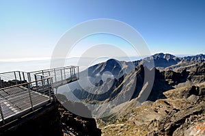 View from Lomnica Peak in High Tatras Mountains with viewing platform, Slovakia