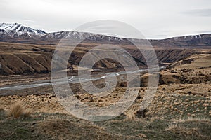 View on lonely mountainous scene with river around Ashburton Lakes where Rohan was filmed, NZ