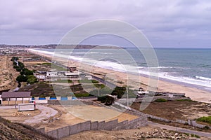 View of a long beach in southern Ecuador, Salinas photo