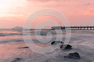 View of the long exposure waves and the sea at dusk from the Loh Jak bridge, KohYao Yai, Phang Nga, Thailand