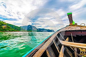 View from long tailed boat in Krabi town, Thailand. Boats are prepared for passenger to famou Railay beach. Boats are traditional