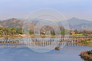 View of longest old wooden bridge on songkhalia river at sangklaburi, kanchanaburi, thailand