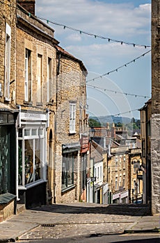 View looking down a deserted Catherine Hill, due to Coronavirus lockdown, in Frome, Somerset, UK