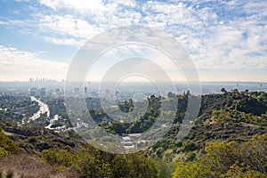 View of Los Angeles from the Hollywood Hills. Down Town LA. Hollywood Bowl. Warm sunny day. Beautiful clouds in blue sky