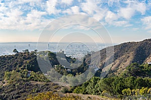 View of Los Angeles from the Hollywood Hills. Down Town LA. Hollywood Bowl. Warm sunny day. Beautiful clouds in blue sky