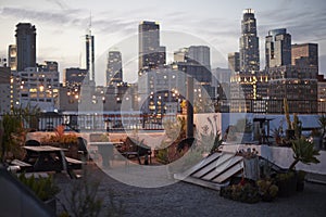 View Of Los Angeles Skyline At Sunset From Roof Terrace