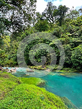 A view of the luminous blue Rio Celeste in Costa Rica