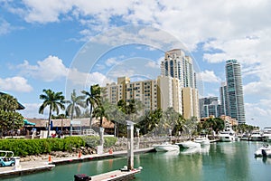 View of luxurious boats and yacht docked in a Miami South Beach Marina luxury life concept