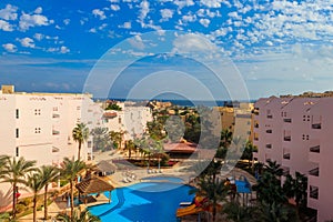 View of luxurious hotel with a swimming pool and Red sea