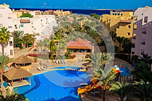 View of the luxurious hotel with swimming pool and Red sea