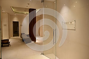 View of luxurious interior of a hall in the bath and sauna at wellness spa center with marble walls