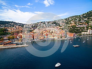 View of luxury resort Villefranche-sur-Mer and bay on French Riviera at Mediterranean Sea. Cote d`Azur. France. Villefranche-sur-