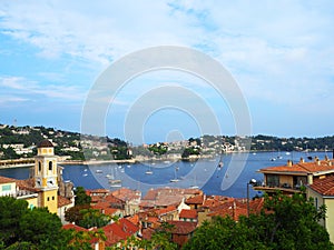 View of luxury resort Villefranche-sur-Mer, old city and bay on French Riviera at Mediterranean Sea. Cote d`Azur. France.