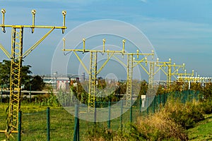 View of lyellow runway approach light pole at the airport in Barcelona Spain