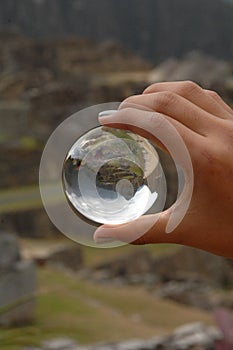 View from Machu Picchu, Peru through glass ball