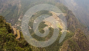 View of Machu Picchu and some terraces from the top of Waynapicchu mountain,