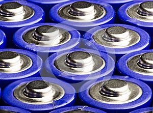 View macro of several AA blue batteries.