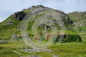 View of Mageroya with Sami frames and mossy huts.