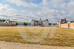 View the main building and auxiliary buildings of the estate of Vaux-le-Vicomte, France photo