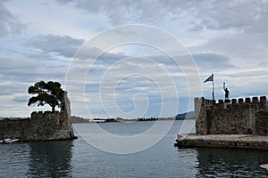 View of the main monuments of Greece. Old town of Lepanto place of the battle where Miguel de Cervantes participated. Greek flag photo