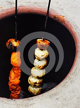 View of making mutton kababs or kebabs on coal fired arrangement