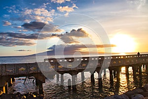 View of mala Pier and Lanai in the distance at sunset.