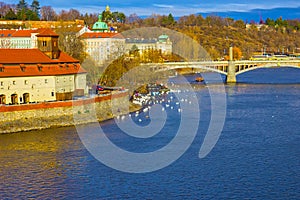 View of Mala Strana and Prague castle and St. Vitus Cathedral over Vltava river