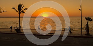 View of malecon with sunset photo