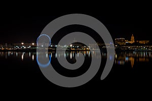 View of Malaga city from harbour, Malaga, spain, Euope at night photo