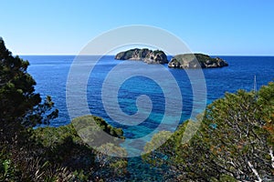 View of Malgrats Islands from Mallorca with waves from the Mediterranean Sea photo