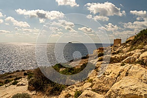 view of malta coast and mediterranean sea at blue grotto, malta