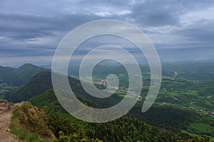 View from Maly Rozsutec to mountain village, Mala Fatra, Slovakia in spring cloudy morning