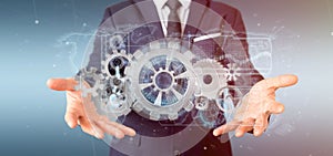 Man holding a technology gear wheel interface3d rendering