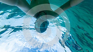 View of a man snorkeling on a sunny day