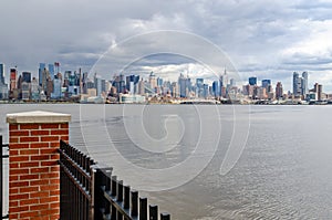 View of Manhattan from the Other side of Hudson River with fence in front, New Jersey