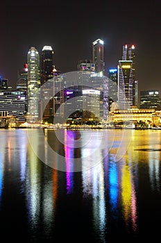 View of the Marina Bay Financial Centre in the evening in Singapore.