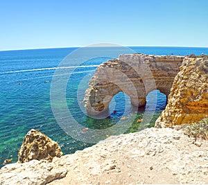 View of the Marina Beach arches (Praia da Marinha) in Lagoa, Faro District, Algarve, Southern Portugal