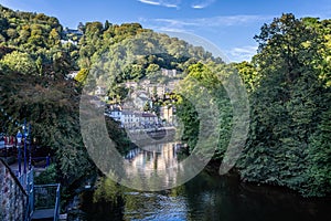 View of Matlock Bath and the River Derwent and surrounding hills in Matlock Bath, Derbyshire, UK