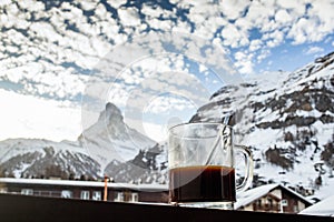 view of Matterhorn through hotel window in Zermatt