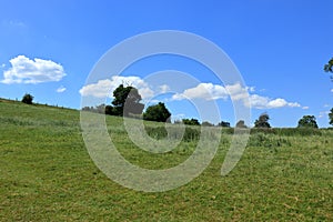 A view of the meadows and trees in the Westerham countryside