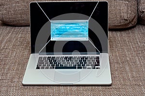 View on a medical mask on a laptop display
