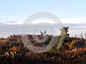 View from the medieval castle in the forest in the autumn afternoon, sunny cold day, wild nature, adventure trip, family travel