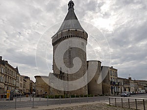 View of medieval fortified tower of port entrance in French city of Libourne