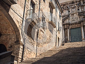 View of the medieval Sant-Domenec steps under the sunlight photo