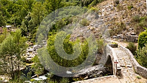 Sant Angelo in Fasanella Italy. View of the medieval stone humpback bridge over the sources of Auso. Ancient communication route